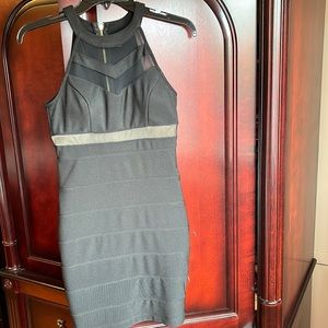 Super fit, mini black dress.